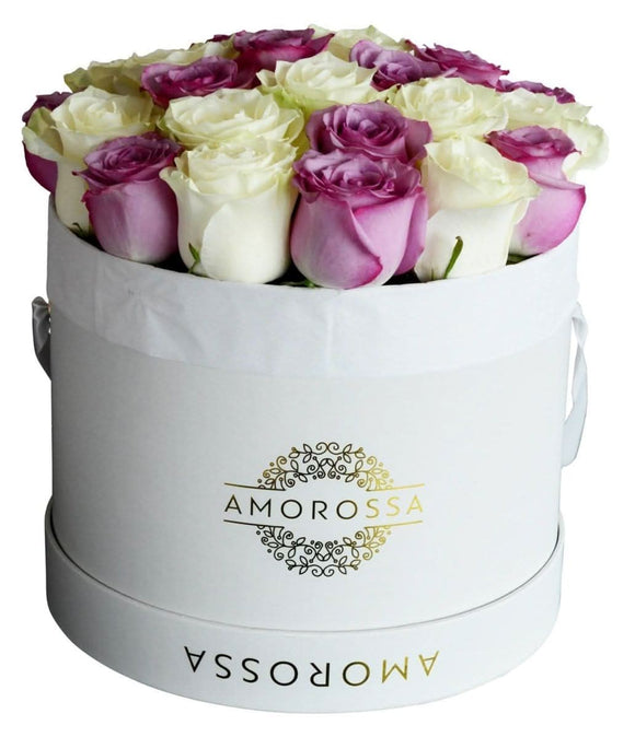 AMOROSSA - Creme Sagol - White round box filled with purple and white roses, elegant floral arrangement for regalar flores and enviar flores with.